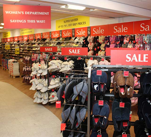 Showcards and hanging boards in retail environment